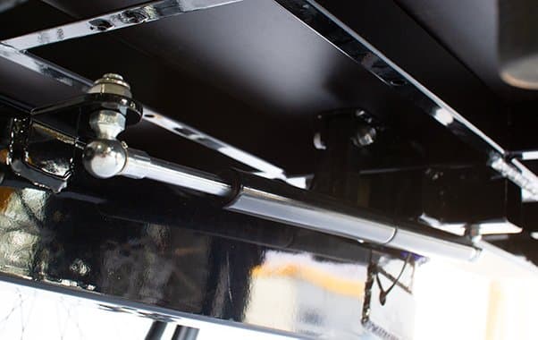 The gas-spring steering damper on a Tribe Original