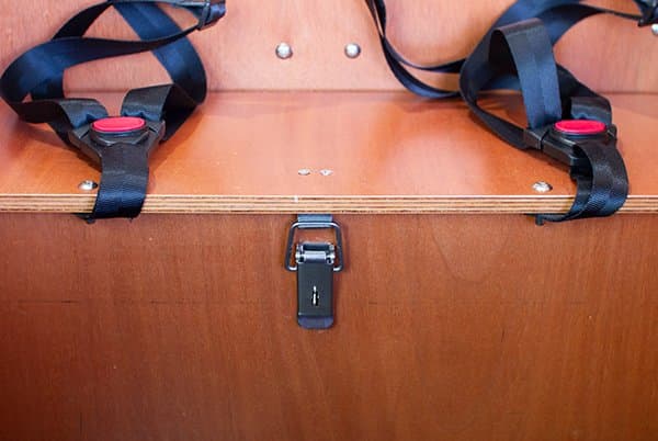 The latch on the lockable storage bench of a Tribe Original