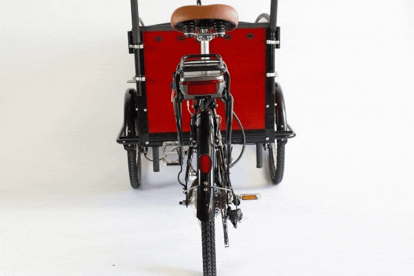 A Tribe Original seen from behind, its anti-tip frame working through a turn