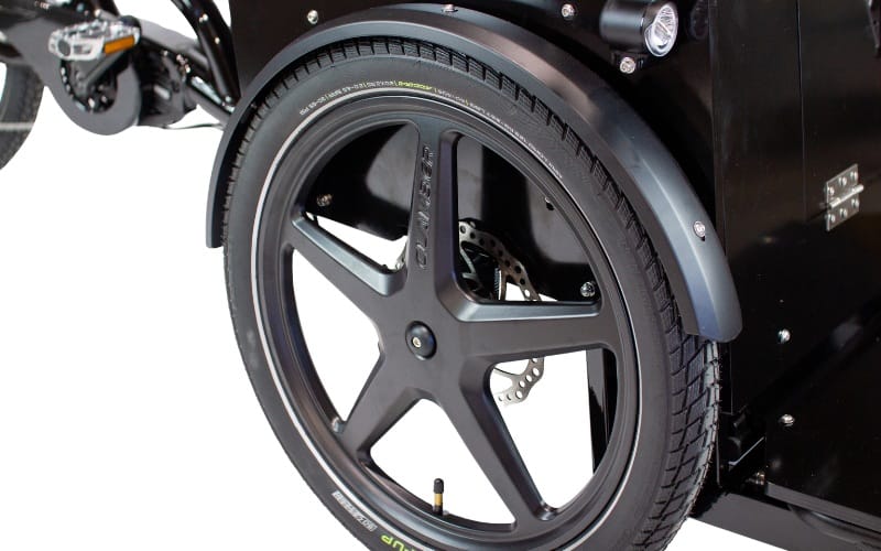 A custom alloy front wheel on a Ricky Rickshaw